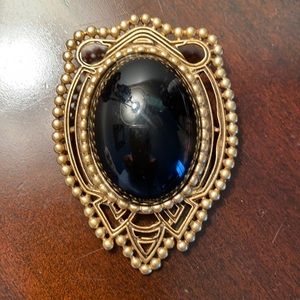 Beautiful Brooch with black center stone